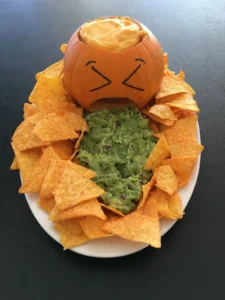 Puking Pumpkin Nacho Platter filled with chips and toppings