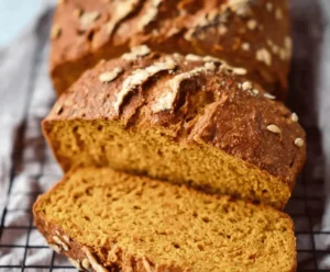 Loaf of fresh Pumpkin Sourdough Bread with autumn spices